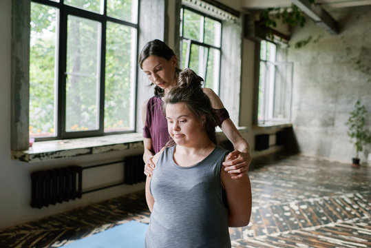 Private yoga class with differently-abled client