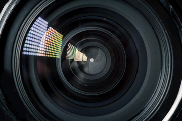 Photo Camera or Video lens close-up on black background, objective, concept of photographer camera man job, looking for a photographer, journalist, a videographer to work