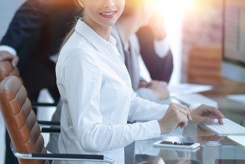 young employee sitting at a Desk