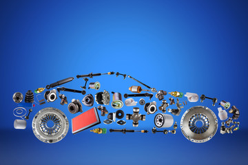Passenger car assembled from new spare auto parts for shop aftermarket. Isolated on blue background.