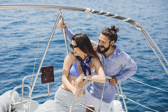 Couple Enjoying Summertime on Yacht