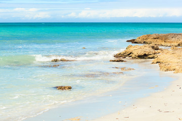 Fototapeta na wymiar The beach of VAtlantic Ocean with a turquoise ocean.Varadero, Cuba