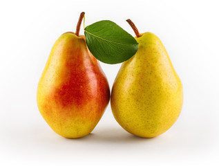 Ripe juicy pears with leaves, close-up, isolated on white background.