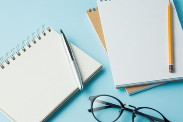 school notebook on a blue background