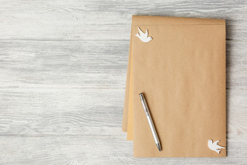 kraft notebook with hearts and doves