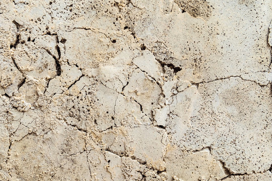 Surface cracked cement concrete. Textural background.
