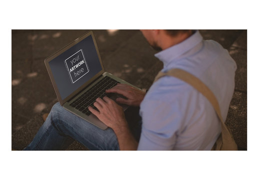 User with Laptop Outside Mockup 2