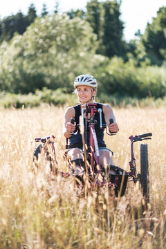 Portrait of Disabled Active Woman on Her Bicycle