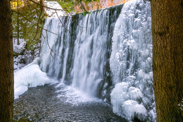 Wild waterfall in winter