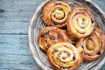Fototapeta premium sweet French buns with raisins