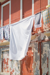 Sheets hanging to dry in Italy.