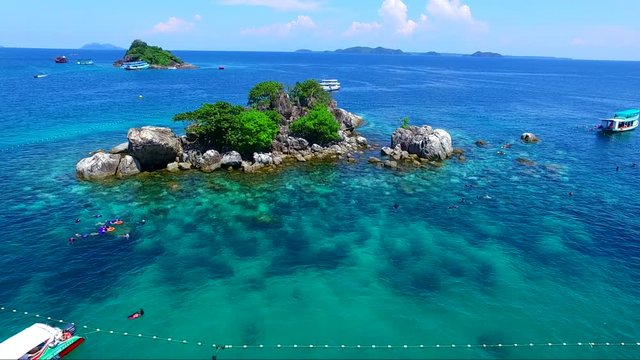snorkeling crystal in clear blue water of the island