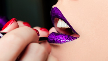 close-up of fashion womanish violet lips