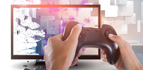 Composite image of woman playing video game against white