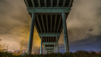 The Golden Ears Bridge, conecting Maple Ridge to Langley. Long exposure at night, reflecting into...