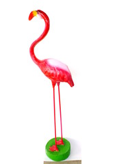 pink ceramic flamingo figures with white background