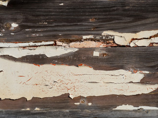 Wood with peeling paint and putty