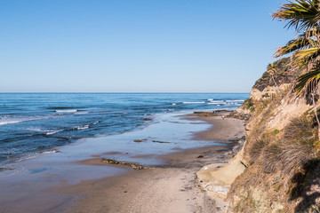 View of Swami's Beach in Encinitas, California at low tide, an internationally known surfing location in San Diego County.