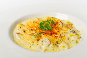 spaghetti carbonara white cream sauce on white background