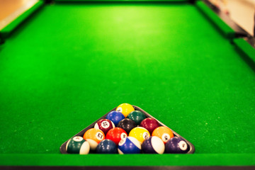 billiard balls on a pool table