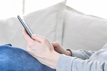 Man reading an e-book on digital tablet device