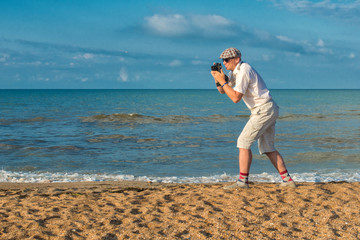 Photographer on a beach
