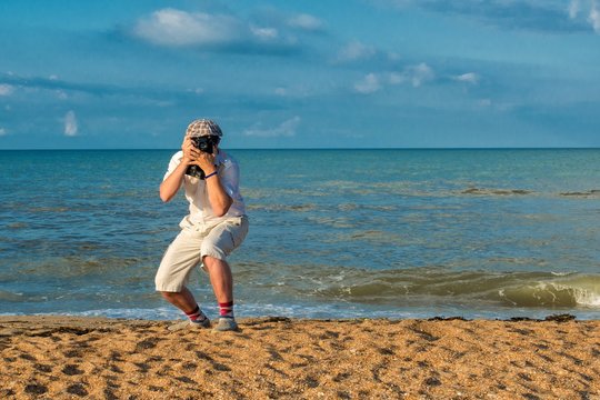 Photographer on a beach