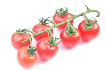 Cherry tomatoes on a white background