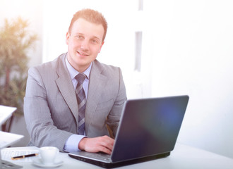 Handsome businessman is working in a office