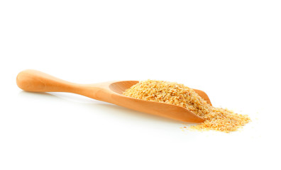 Wheat germ in wood scoop isolated on white background