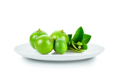 Lemon in white plate on white background