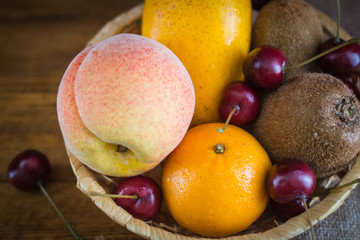 The fruit in the basket.  Still life of fruit.