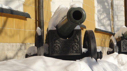 Old guns covered with snow.