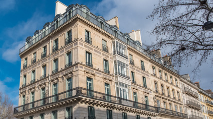Fototapeta na wymiar Paris, beautiful building in the center, typical parisian facade, place de la Madeleine 
