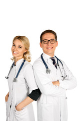 Fototapeta premium Portrait of two happy smiling young medical people, isolated over white background. Doctors