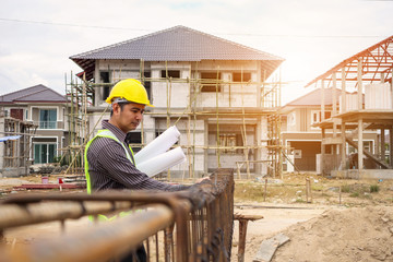 professional engineer worker at the house building construction site