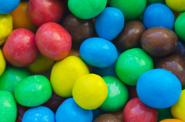 Sugar candies of bright colors background