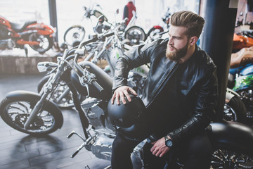 Man in motorcycle shop