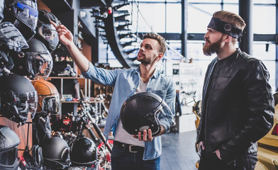 Men in motorcycle shop