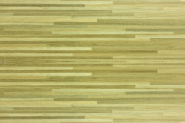 Hardwood maple basketball court floor viewed from above.
