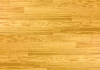 Hardwood maple basketball court floor viewed from above.