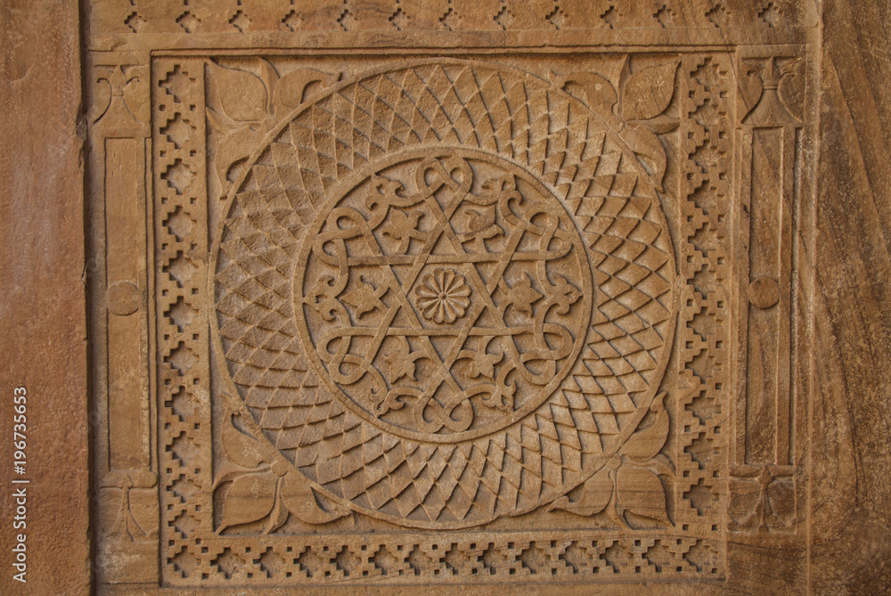 Wall mural Stone carving in Indian style - geometric shapes, circle inside the square