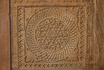 Stone carving in Indian style - geometric shapes, circle inside the square