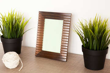 Decorative photo frame over white wall