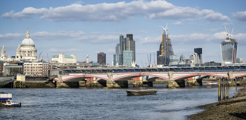 Obraz na płótnie Canvas Stunning large panorama of London City skyline on lovely blue sky Summer day