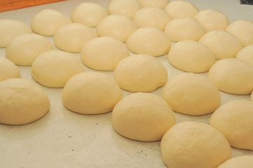 Fototapeta na wymiar Process of cooking tandoor bread national Uzbek flatbread