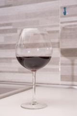 glass of red wine in the kitchen