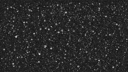 falling snow on black background