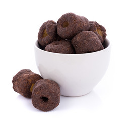 Crunchy corn chocolate snacks on a white background