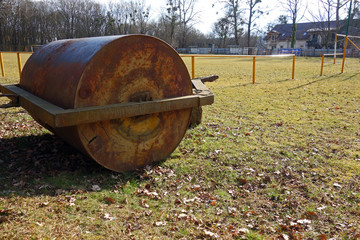 Metal roller on the lawn